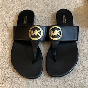 Michael Kors leather flip flops. Size 8 1/2.